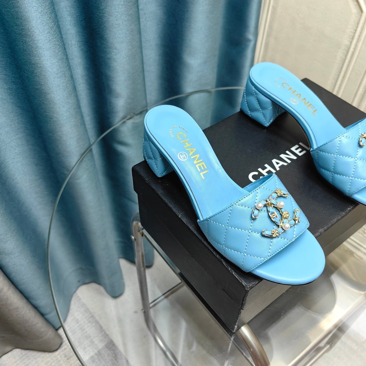CHANEL MULE SLIDE SANDAL IN SKY BLUE LAMBSKIN