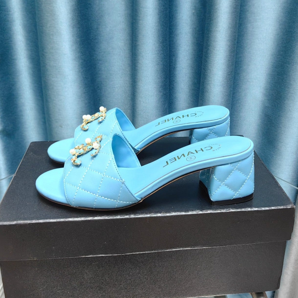 CHANEL MULE SLIDE SANDAL IN SKY BLUE LAMBSKIN