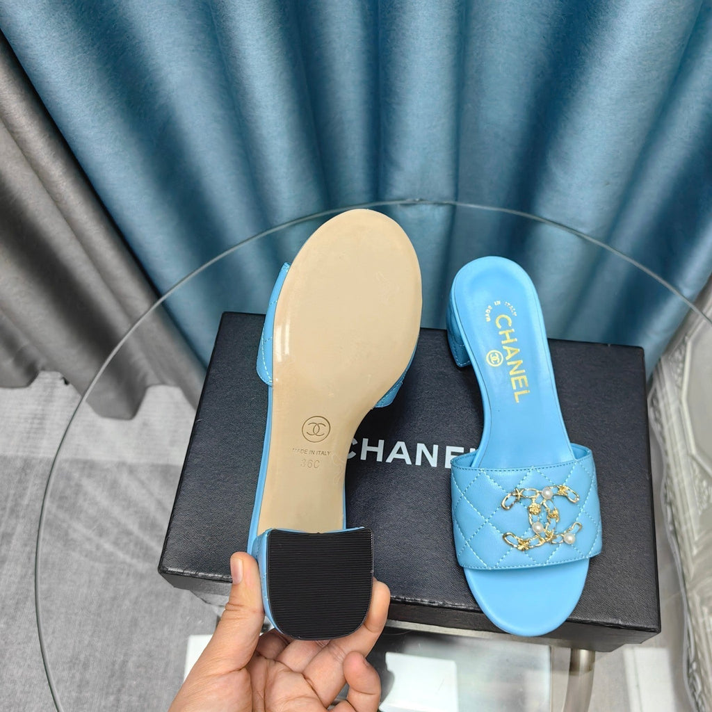 CHANEL MULE SLIDE SANDAL IN SKY BLUE LAMBSKIN