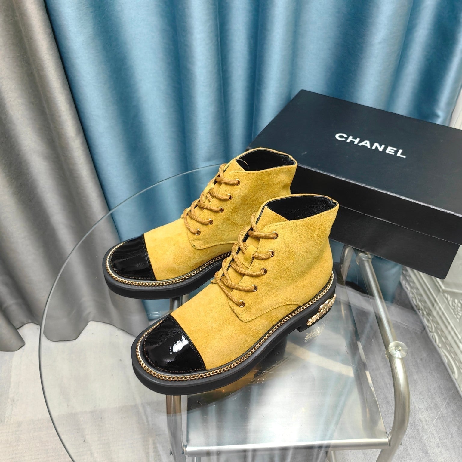 CHANEL SHORT BOOTS IN GOLD YELLOW SUEDE AND BLACK SHEEPSKIN