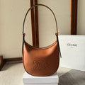 CELINE SMALL HELOÏSE BAG CUIR 22 IN GINGER ORANGE CALFSKIN EMBOSSED LOGO