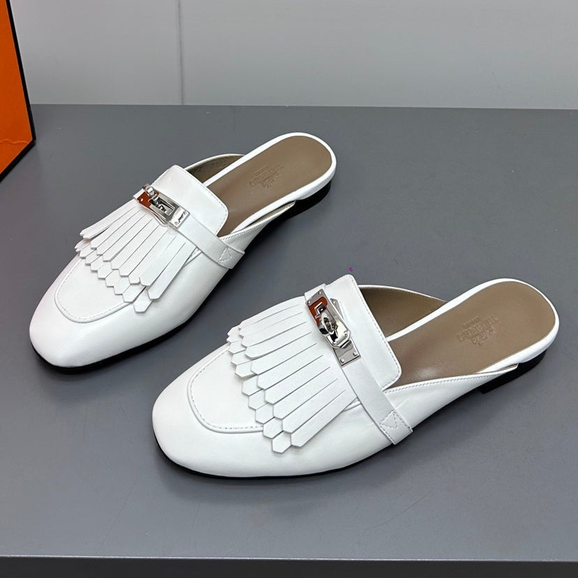 HERMES 0Z MULE IN WHITE LAMBSKIN WITH FRINGE DETAIL