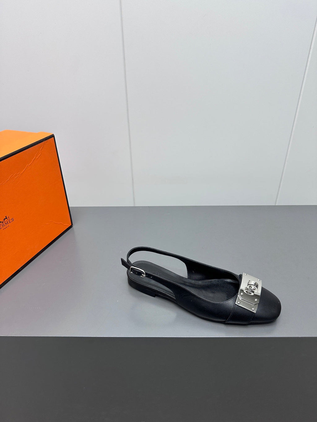 HERMES INNOCENTE SLINGBACK IN BLACK CALFSKIN