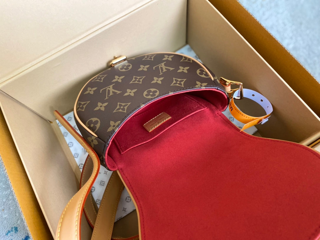 LOUIS VUITTON SADDLE BAG 18 IN BROWN MONOGRAM CANVAS AND LEATHER TRIM