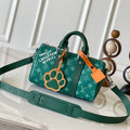 LOUIS VUITTON KEEPALL BANDOULIÈRE 25 IN GREEN MONOGRAM HERITAGE CANVAS