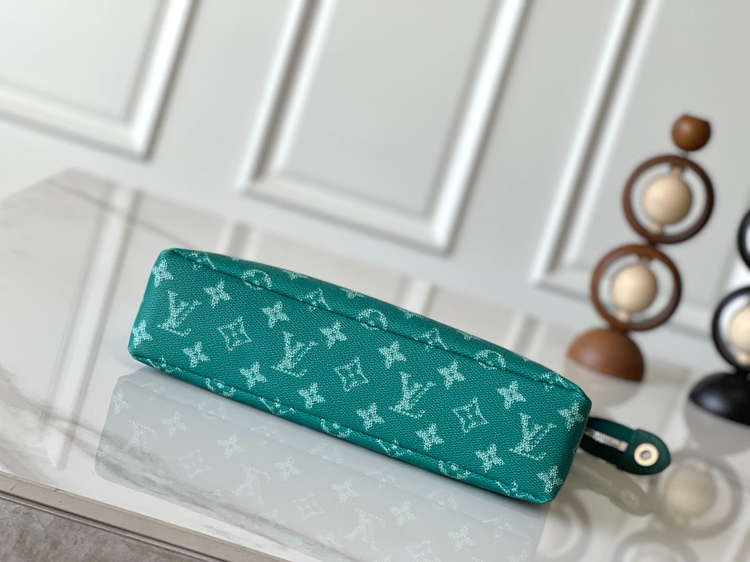 LOUIS VUITTON POCHETTE VOYAGE SOUPLE 32 IN GREEN MONOGRAM HERITAGE CANVAS
