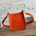 HERMES MINI NEO 17 EVELYNE BAG IN FIRE ORANGE CANVAS AND CALFSKIN