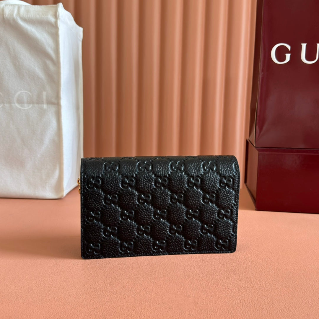 GUCCI EMBLEM WALLET ON CHAIN 20 IN BLACK SMOOTH  CALFSKIN