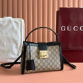 GUCCI 26S PADLOCK TOP HANDLE BAG 25 IN DARK BEIGE AND BLACK CALFSKIN