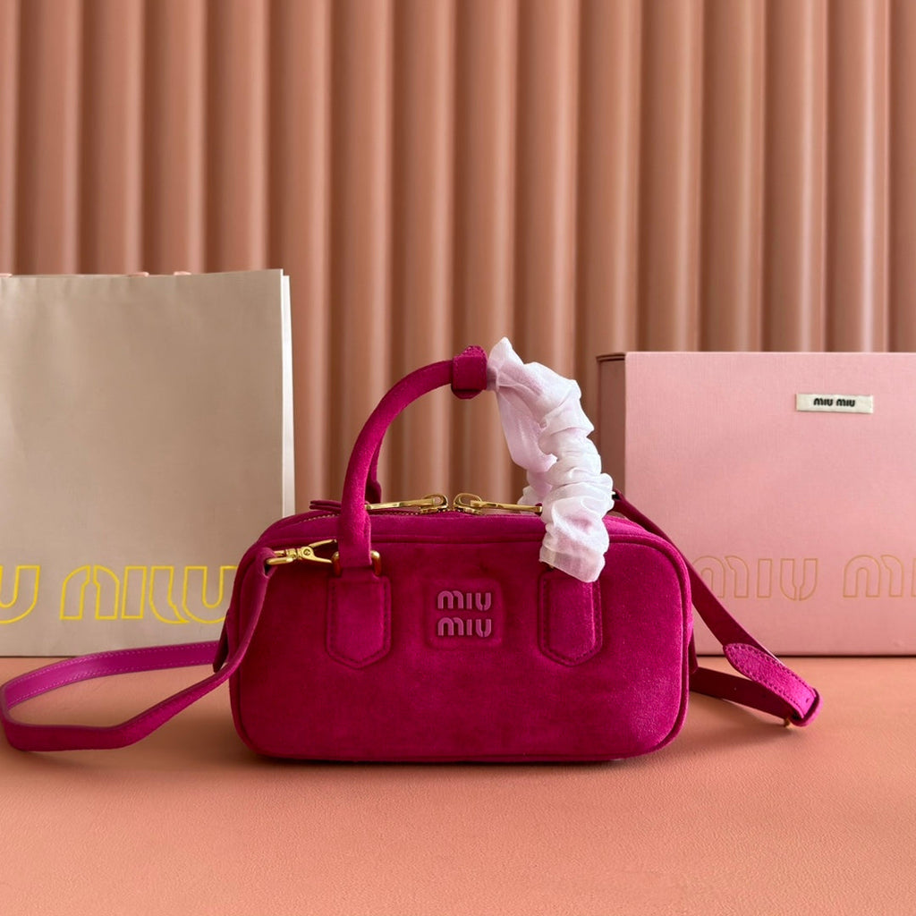 ARCADIE BAG 22 IN FUCHSIA SUEDE GOLD HARDWARE
