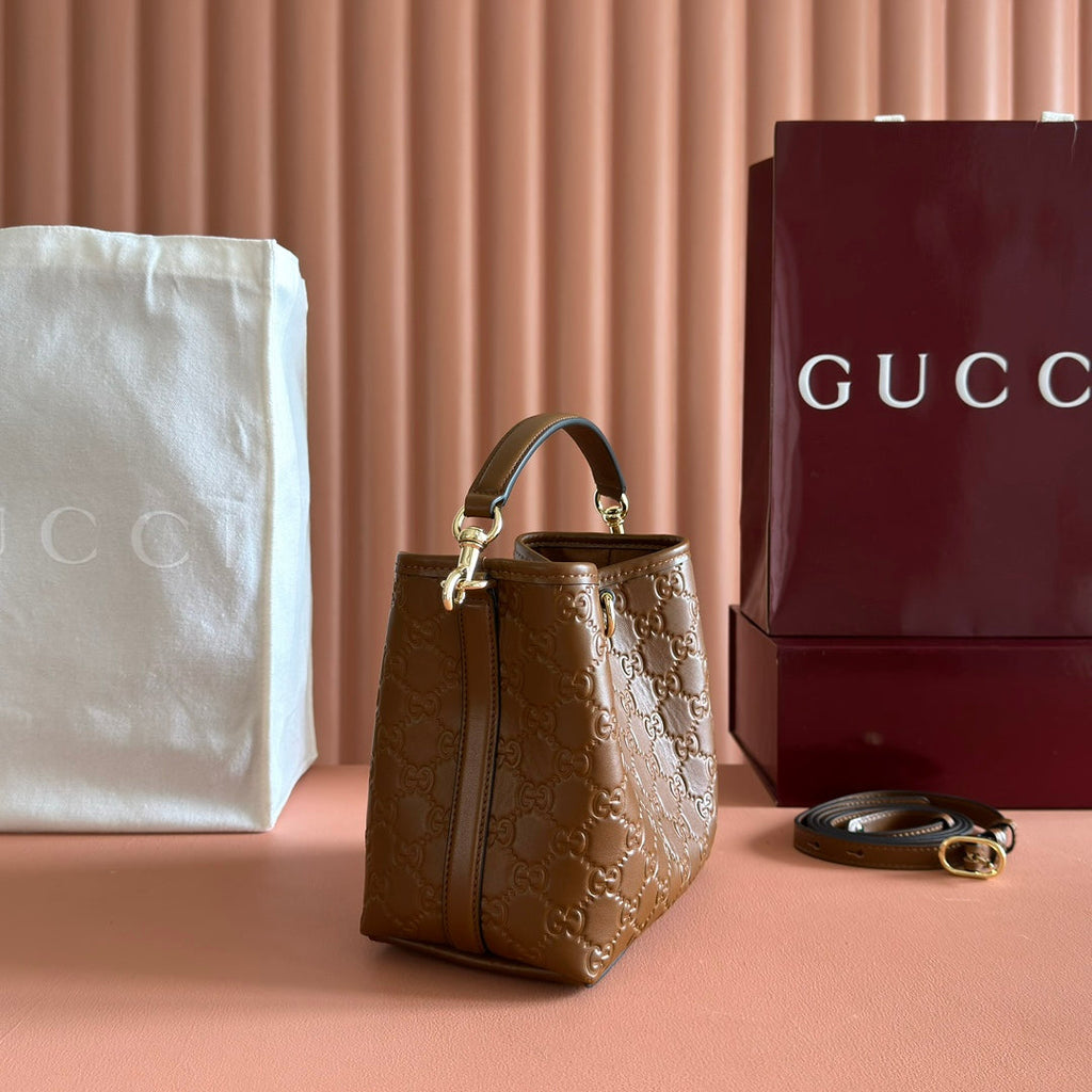 GUCCI 26S HAND BAG 19 IN BROWN CALFSKIN WITH MONOGRAM PATTERN