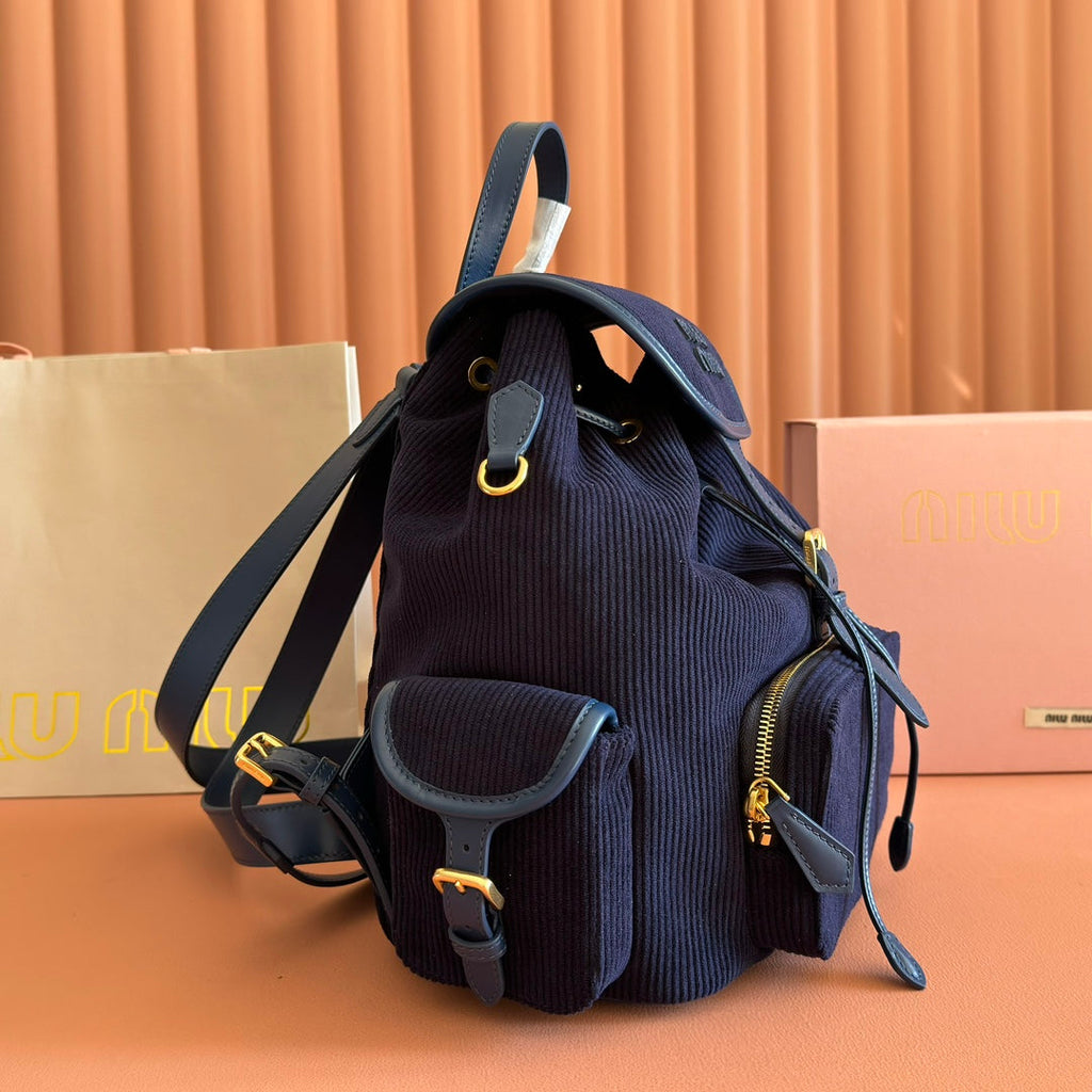 MIUMIU 26S MEDIUM BACKPACK 29 IN DARK BLUE CANVAS BLUE CALFSKIN