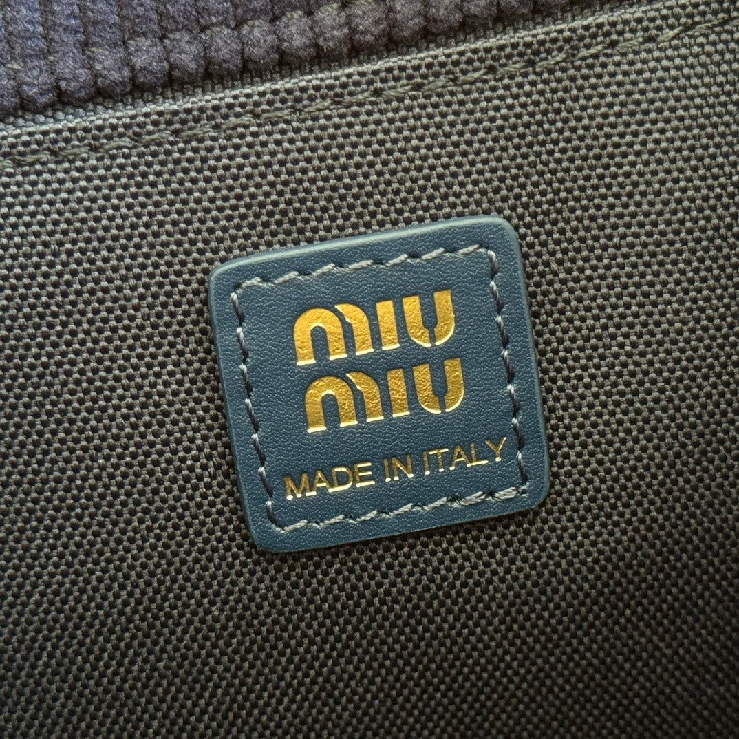 MIUMIU 26S BACKPACK 22 IN DARK BLUE CANVAS BLUE CALFSKIN