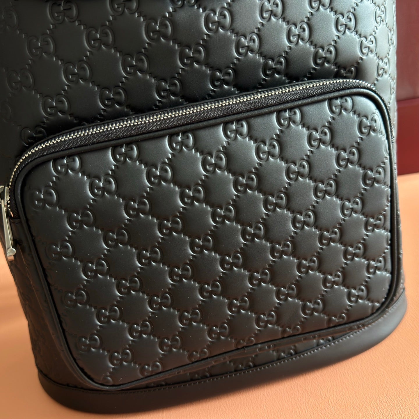 GUCCI 26S  EMBLEM BACKPACK 44 IN BLACK EMBOSSED CALFSKIN