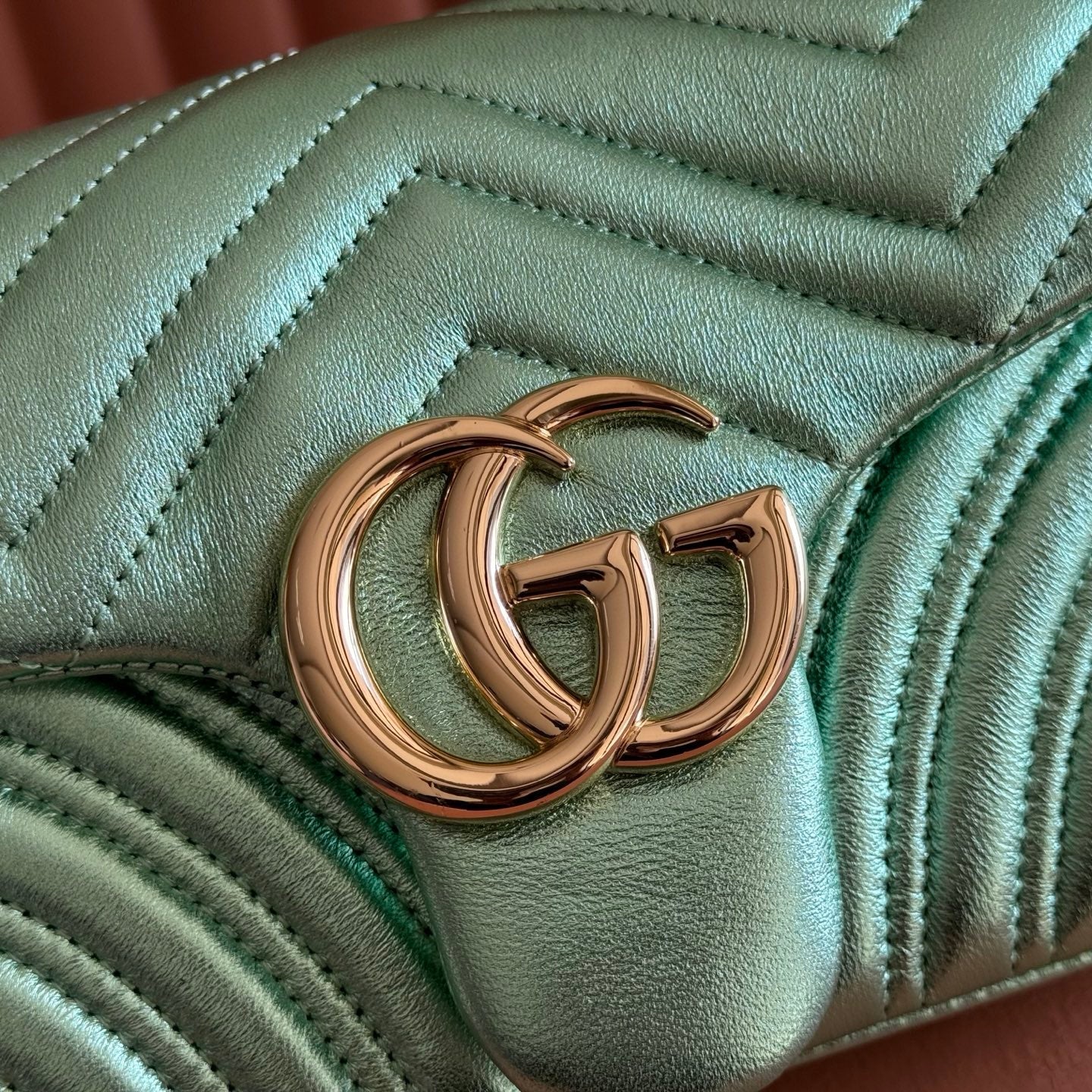 GUCCI 26S  MARMONT BAG 26 IN METALLIC PALE GREEN LAMBSKIN
