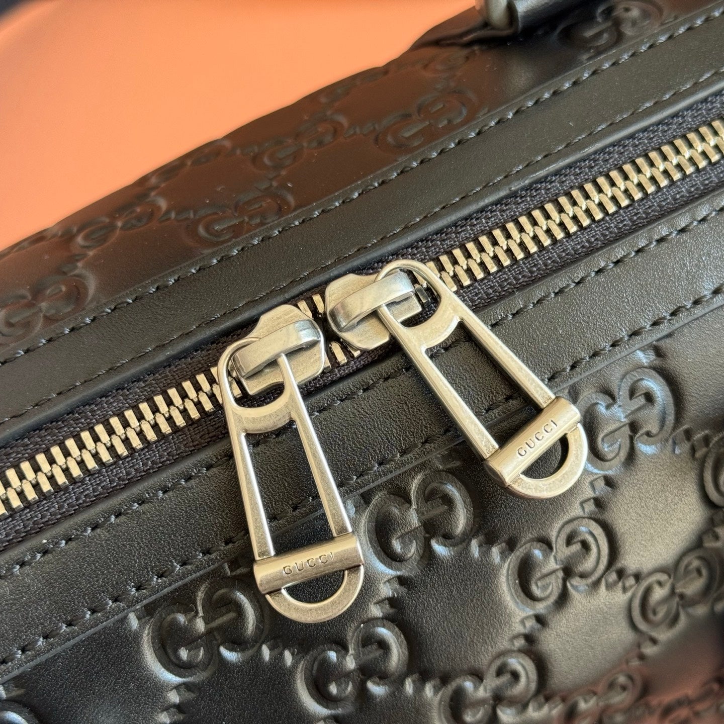 GUCCI 26S EMBLEM DUFFLE BAG 25 IN BLACK EMBOSSED CALFSKIN