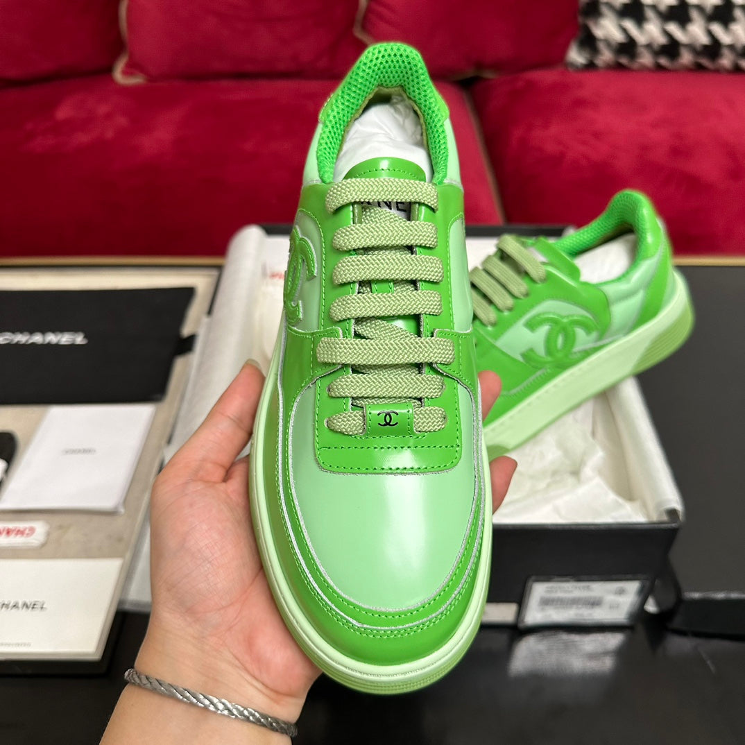 CHANEL TRAINERS IN LIGHT GREEN SHINY CALFSKIN
