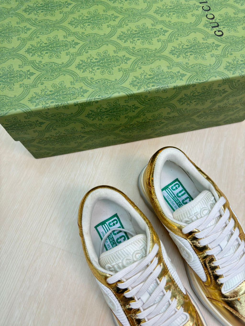 GUCCI INTERLOCKING G SNEAKER GOLD CALFSKIN AND FABRIC