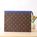 LOUIS VUITTON LV 25S POCHETTE VOYAGE 26 IN INDIGO BLUE MONOGRAM MACASSAR COATED CANVAS