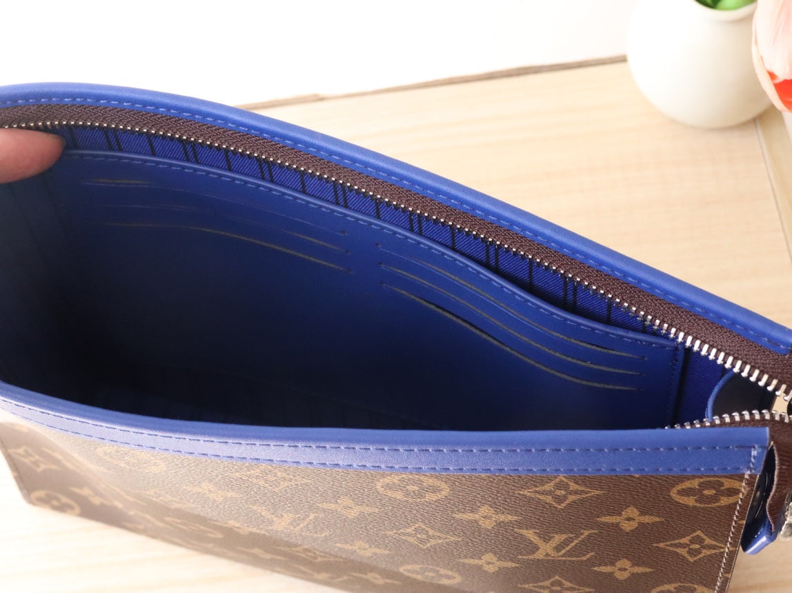 LOUIS VUITTON LV 25S POCHETTE VOYAGE 26 IN INDIGO BLUE MONOGRAM MACASSAR COATED CANVAS