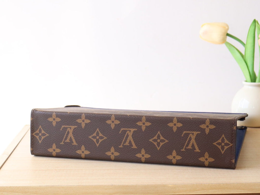 LOUIS VUITTON LV 25S POCHETTE VOYAGE 26 IN INDIGO BLUE MONOGRAM MACASSAR COATED CANVAS