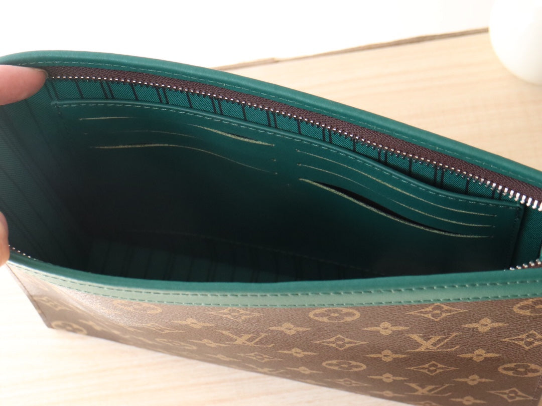 LOUIS VUITTON LV 25S POCHETTE VOYAGE 26 IN BORNEO GREEN MONOGRAM MACASSAR COATED CANVAS