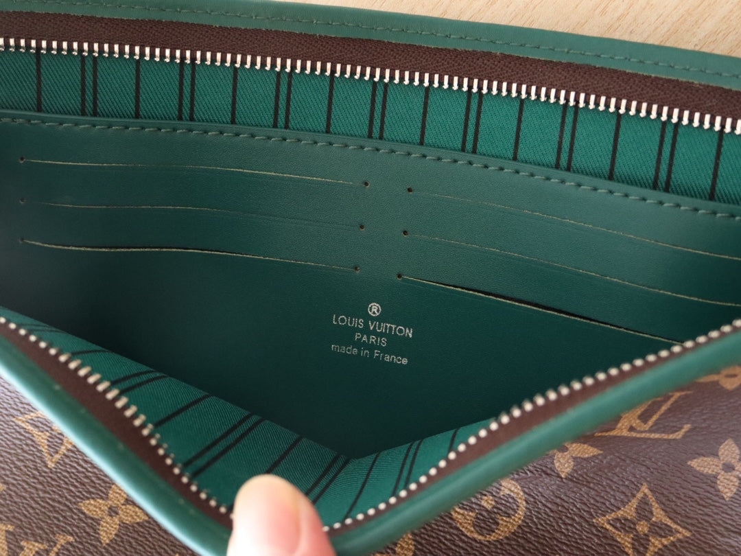 LOUIS VUITTON LV 25S POCHETTE VOYAGE 26 IN BORNEO GREEN MONOGRAM MACASSAR COATED CANVAS