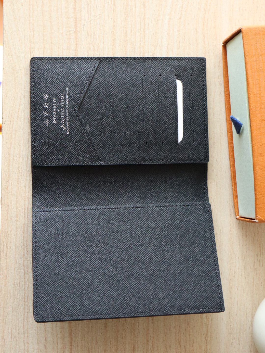 LOUIS VUITTON DOLL PASSPORT WALLET IN BLACK MIX COLORFUL CALFSKIN