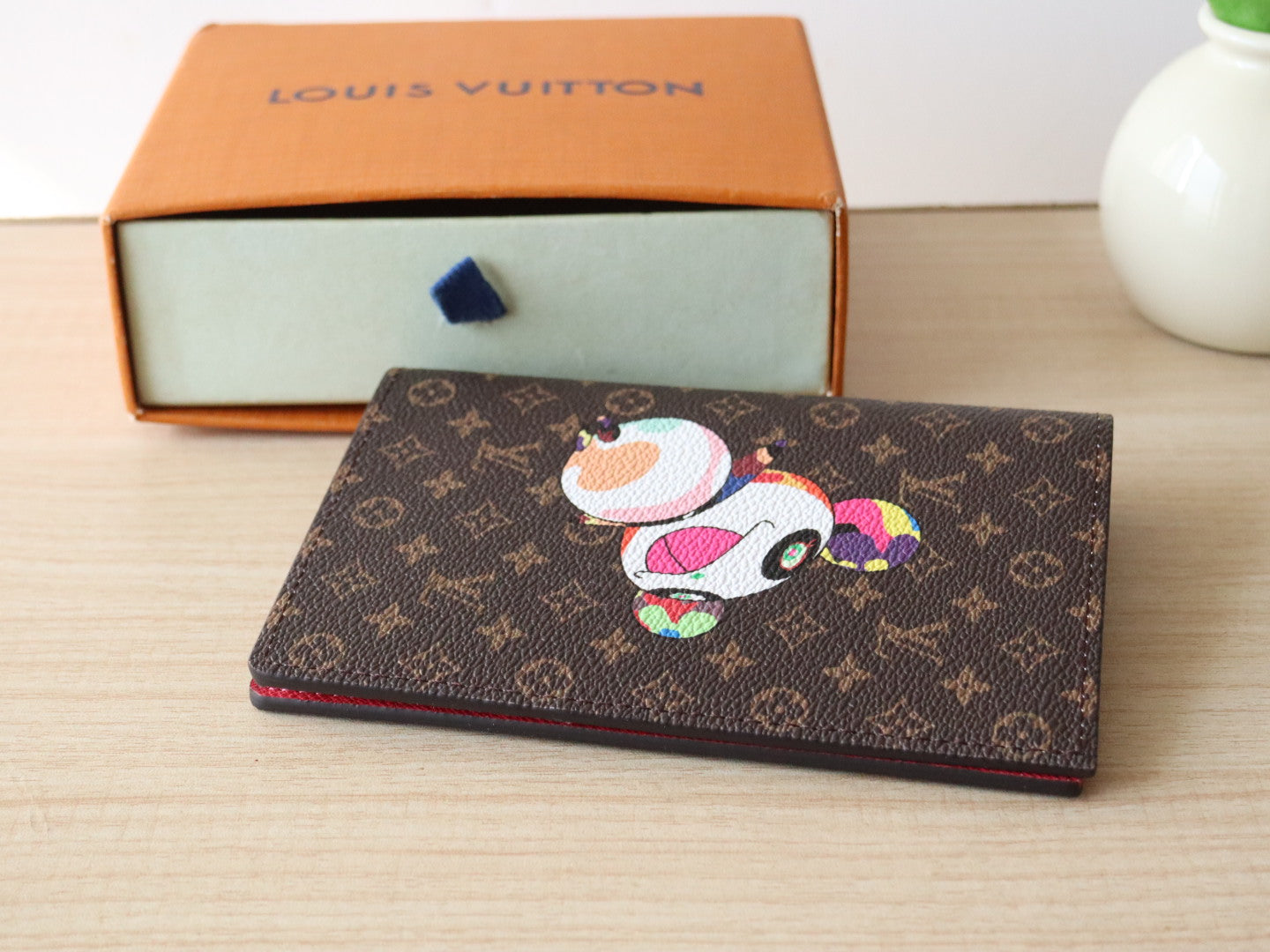 LOUIS VUITTON DOLL PASSPORT WALLET IN CHOCOLATE BROWN MONOGRAM CALFSKIN