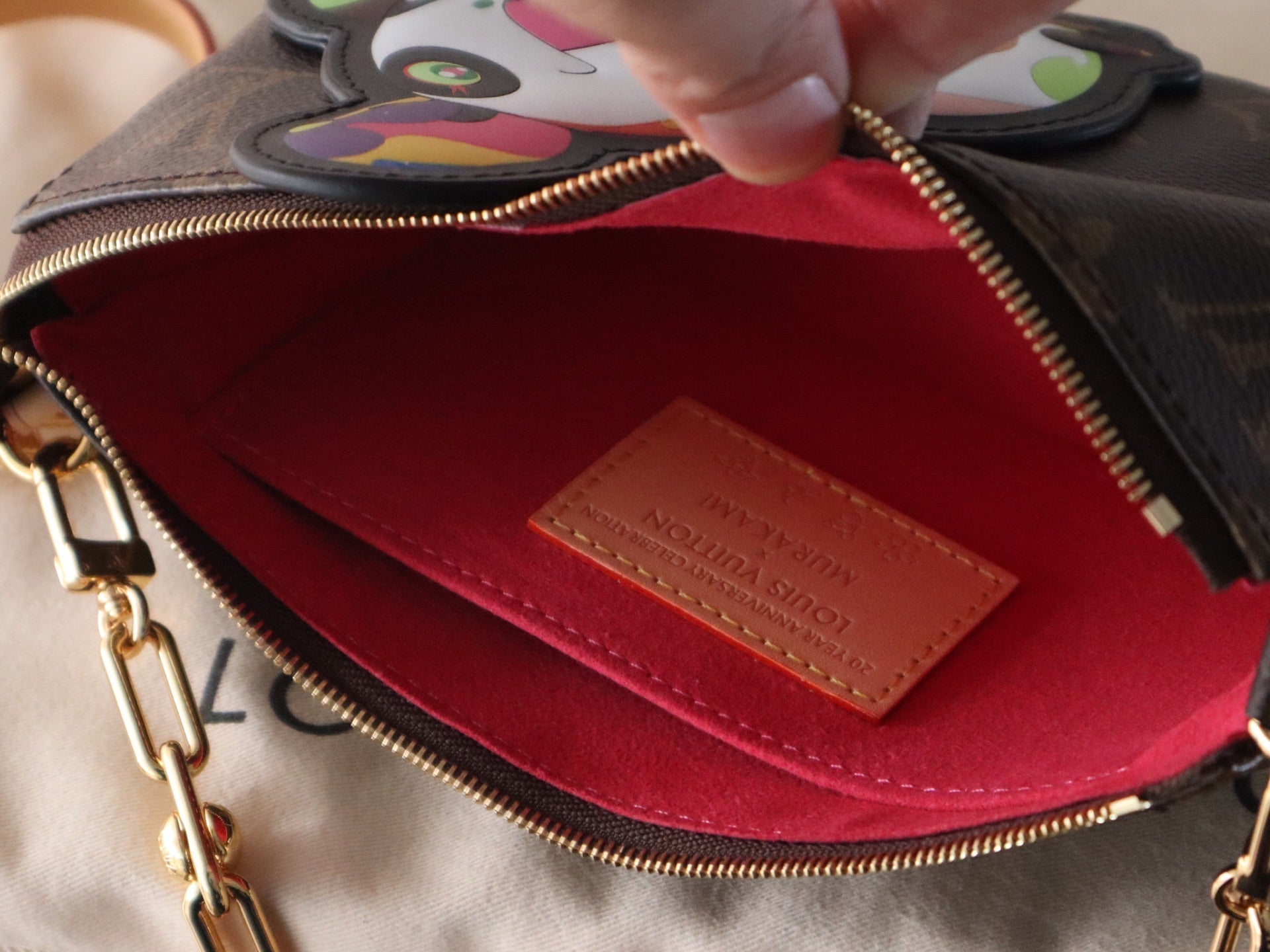 LOUIS VUITTON PANDA POCHETTE BAG 22 IN BROWN MONOGRAM COATED CANVAS