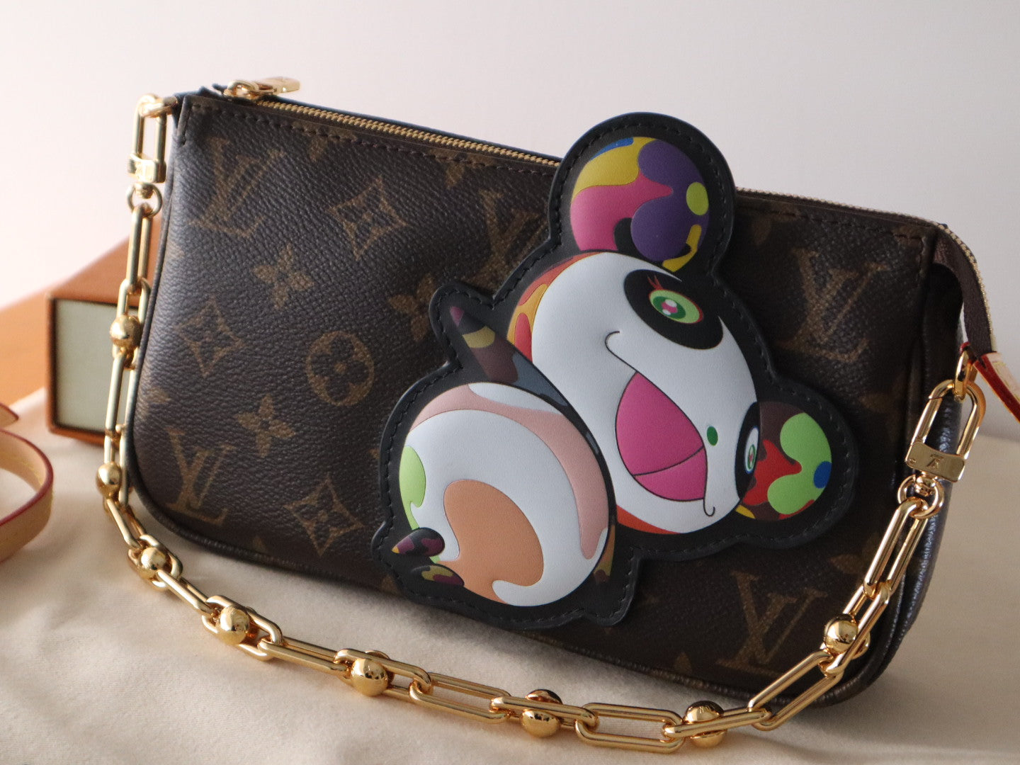 LOUIS VUITTON PANDA POCHETTE BAG 22 IN BROWN MONOGRAM COATED CANVAS