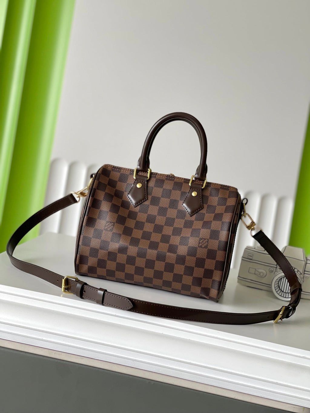 LOUIS VUITTON SPEEDY BANDOLIÈRE 25 IN DARK BROWN DAMIER EBENE CANVAS GOLD HARDWARE