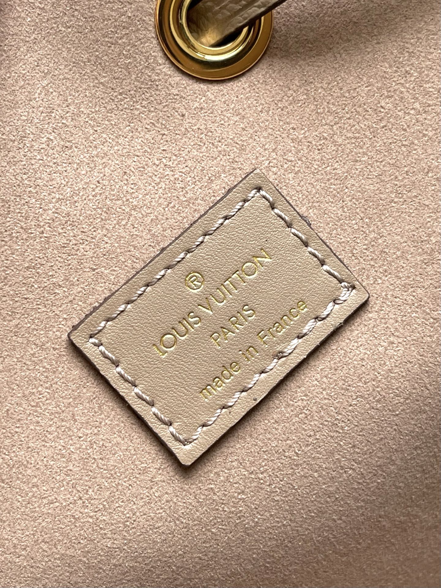 LOUIS VUITTON CRAFTY NEONOE 26 IN BROWN AND CREAM BICOLOR EMPREINTE CALFSKIN