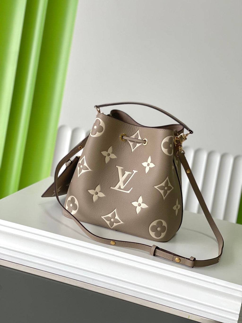 LOUIS VUITTON CRAFTY NEONOE 26 IN BROWN AND CREAM BICOLOR EMPREINTE CALFSKIN