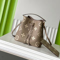 LOUIS VUITTON CRAFTY NEONOE 26 IN BROWN AND CREAM BICOLOR EMPREINTE CALFSKIN