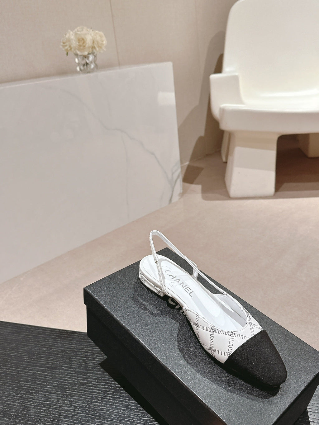 CHANEL SLINGBACKS IN WHITE LAMBSKIN AND BLACK SATIN