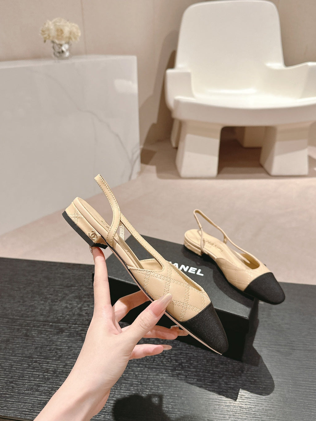 CHANEL SLINGBACKS IN BEIGE CREAM LAMBSKIN AND BLACK SATIN