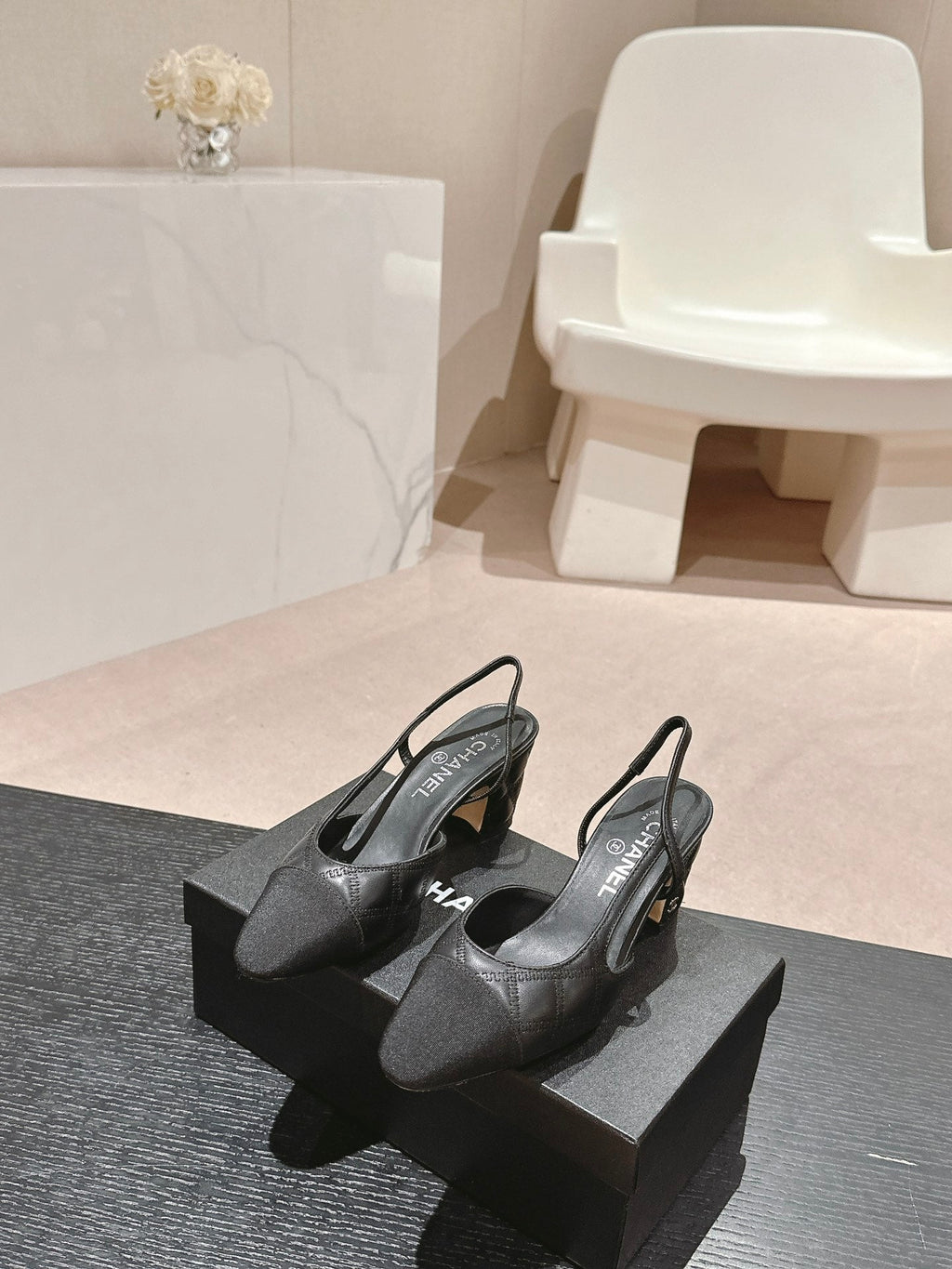 CHANEL HIGH SLINGBACKS IN BLACK LAMBSKIN AND SATIN