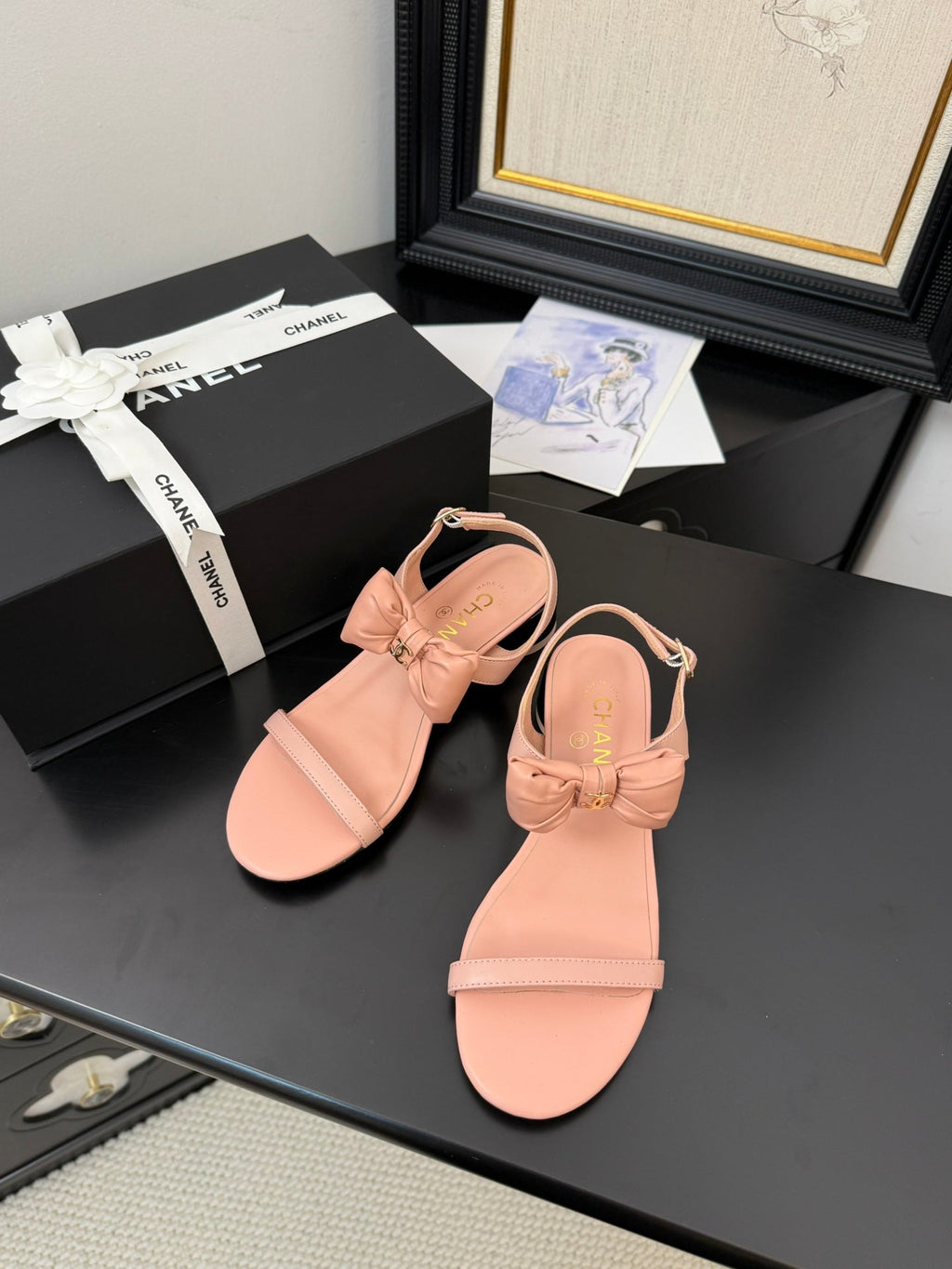 CHANEL FLAT SANDALS IN PEACHY PINK CALFSKIN WITH BOW