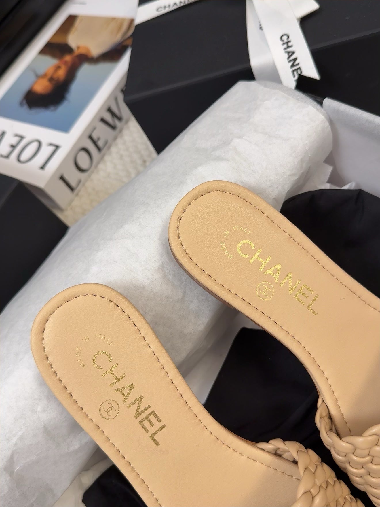 CHANEL FLAT SLIDES IN FLAX YELLOW LAMBSKIN