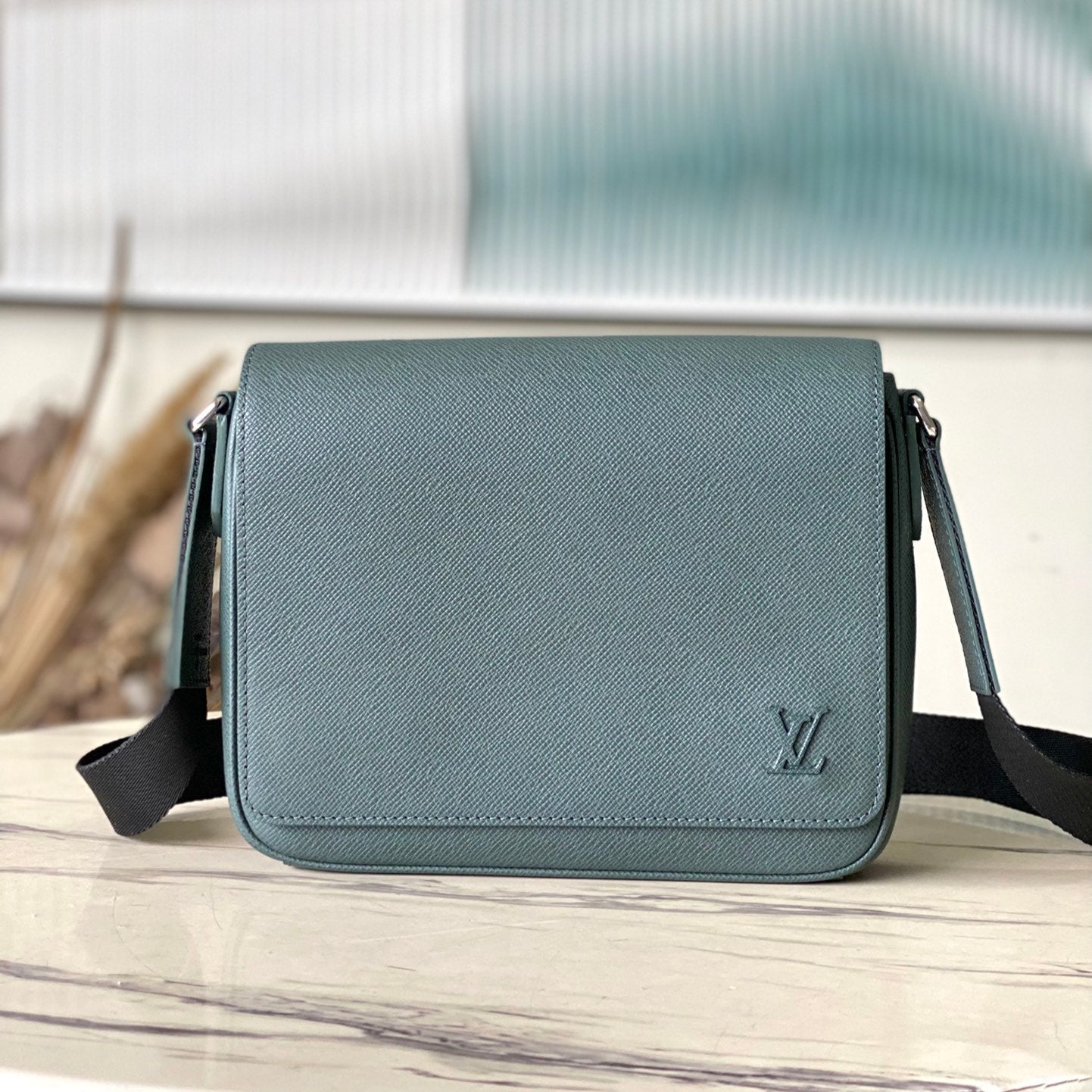 LOUIS VUITTON DISTRICT PM 26 IN CELESTE GREEN CALFSKIN