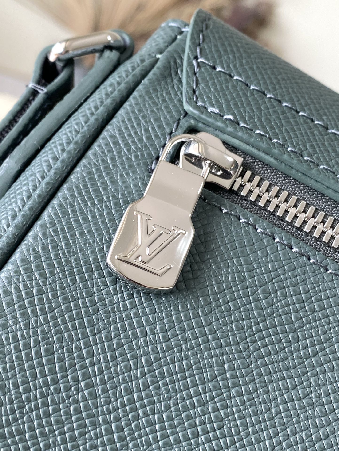 LOUIS VUITTON DISTRICT PM 26 IN CELESTE GREEN CALFSKIN