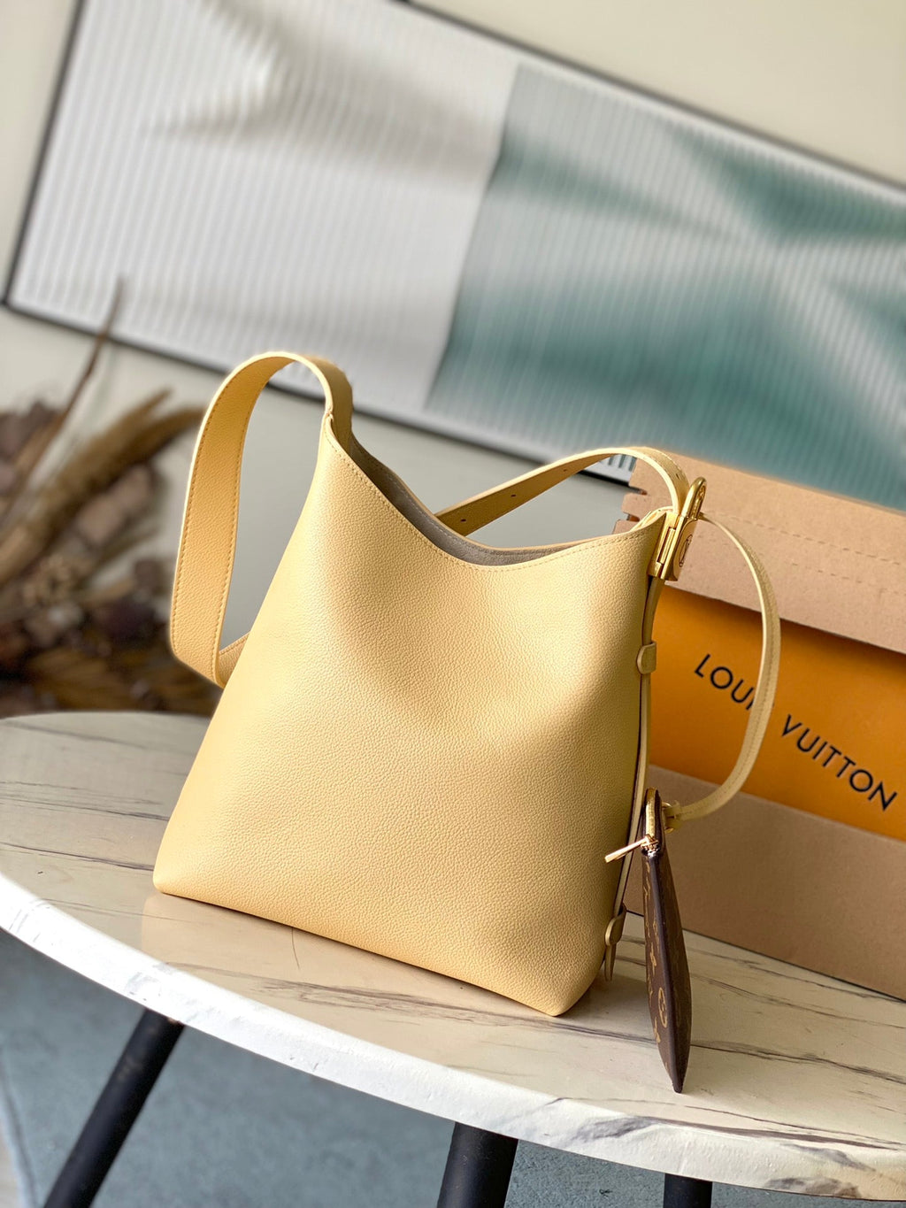 LOUIS VUITTON LOW KEY HOBO PM 28 IN URBAN YELLOW CALFSKIN GOLD BUCKLE