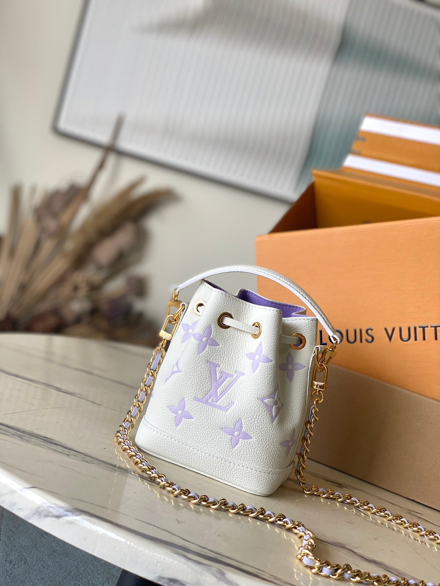 LOUIS VUITTON NANO NOÉ 16 IN WHITE PURPLE MONOGRAM EMBOSSED CALFSKIN