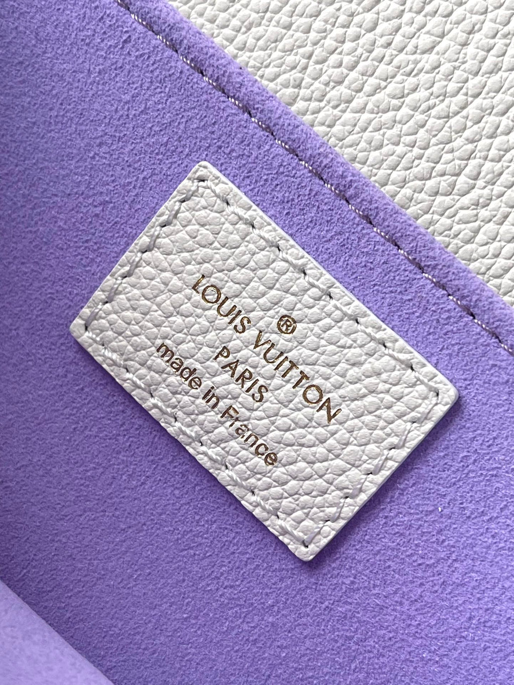 LOUIS VUITTON POCHETTE METIS EAST WEST 21 IN WHITE PURPLE MONOGRAM EMPREINTE LEATHER