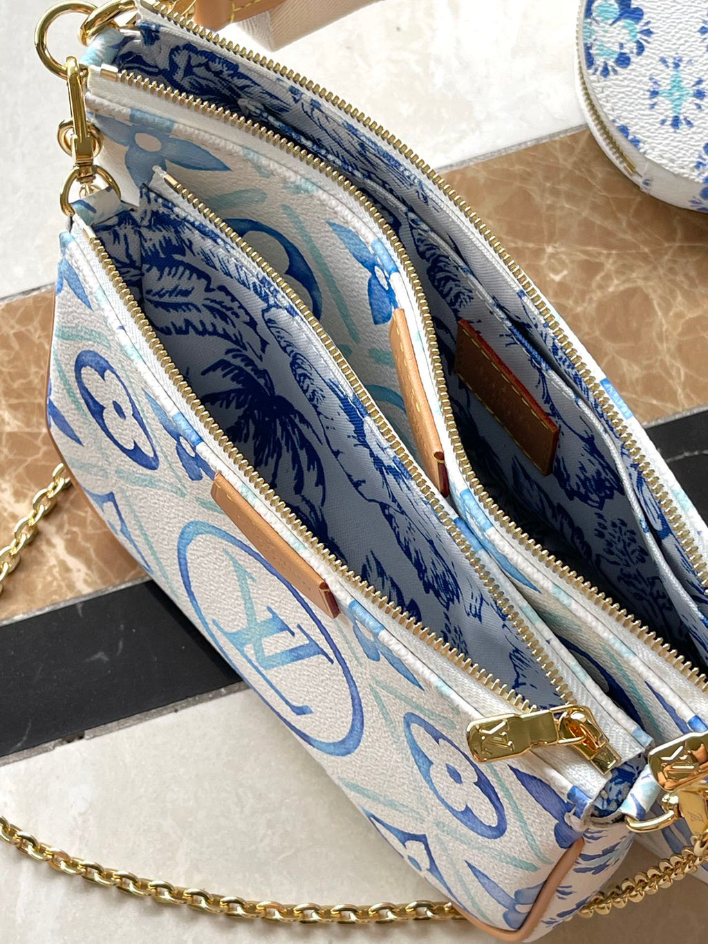LOUIS VUITTON MULTI POCHETTE ACCESSOIRES 24 IN LAGOON BLUE MONOGRAM TILES CANVAS GOLD HARDWARE
