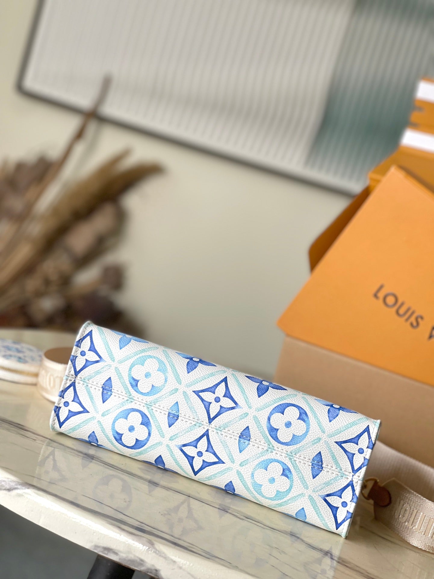 LOUIS VUITTON ONTHEGO EAST WEST 25 IN LAGOON BLUE MONOGRAM TILES CANVAS