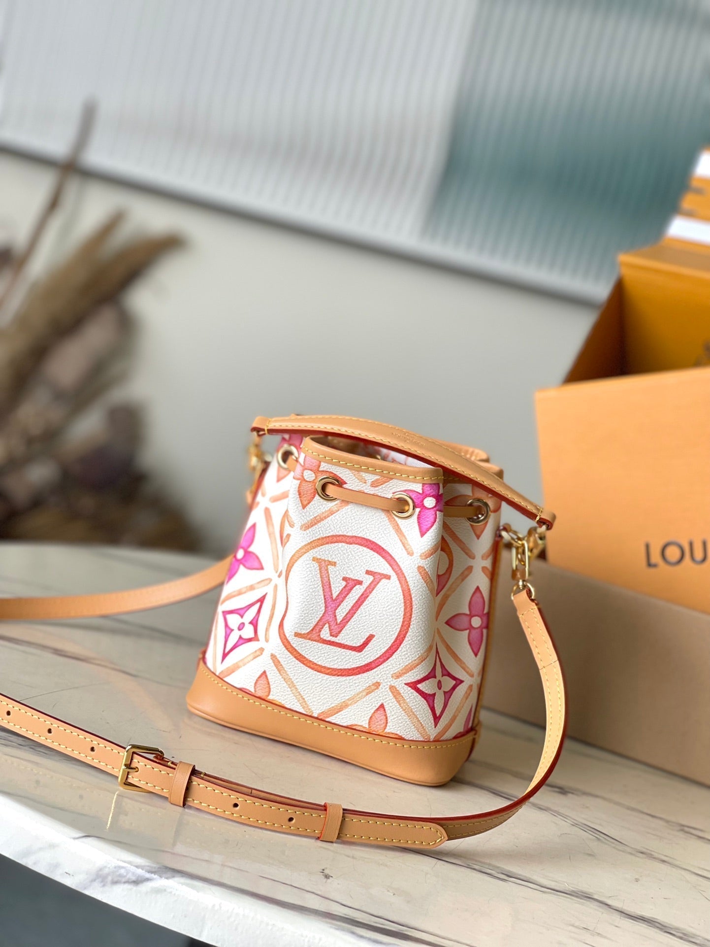 LOUIS VUITTON NANO NOÉ 16 IN CORAL MONOGRAM TILES CANVAS