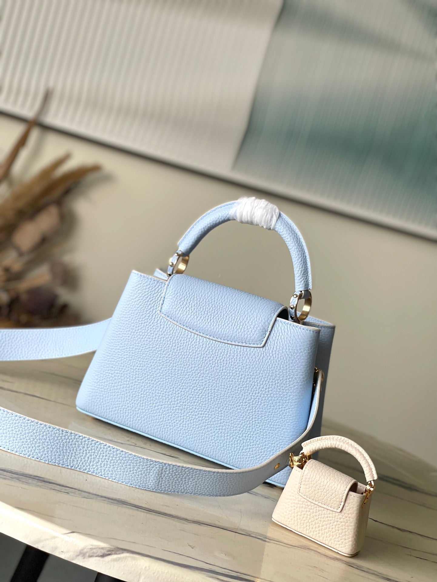 LOUIS VUITTON CAPUCINES BB 26 IN CANDY BLUE TAURILLON GOLD HARDWARE