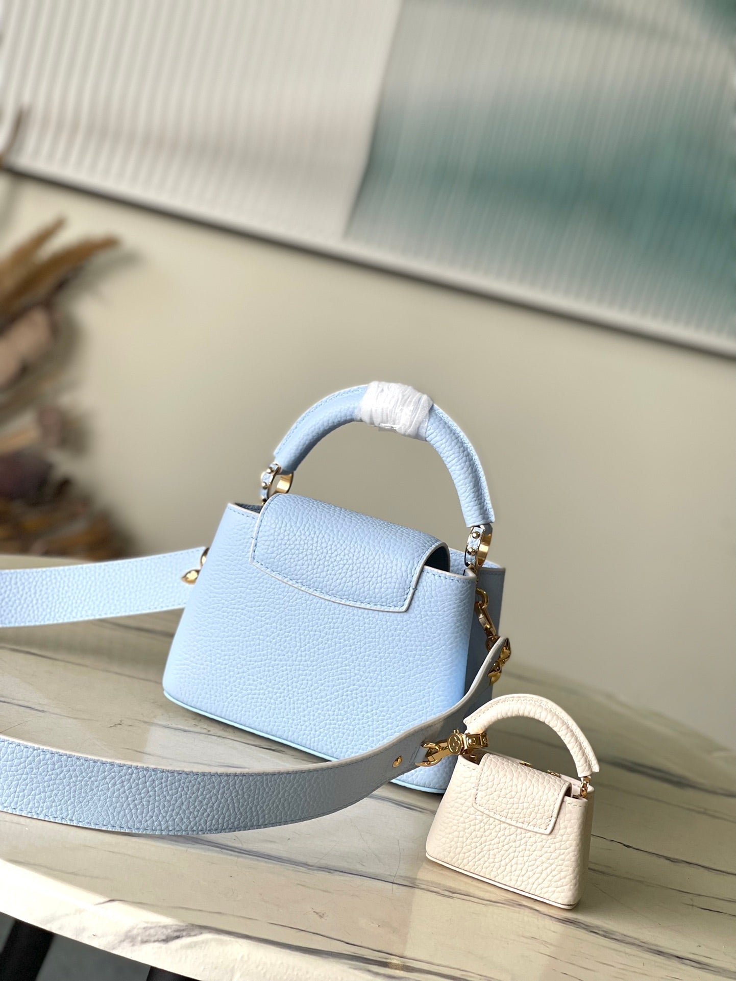 LOUIS VUITTON CAPUCINES MINI 21 IN CANDY BLUE TAURILLON GOLD HARDWARE